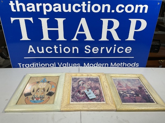 3 frames with artwork.