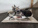 Small Harley Davidson bike on base Hammer for size reference