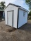 8x12 Building with tin roof and two side windows