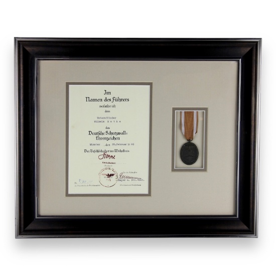 German WW2 West Wall Medal awarded Unteroffizier Sergeant Wilhelm Rothe in Munster February 28, 1940
