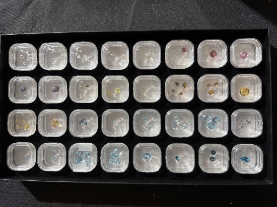 Gemstones- 32 containers with Topaz