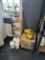 Boxes Of Cleaning Supplies And Boots