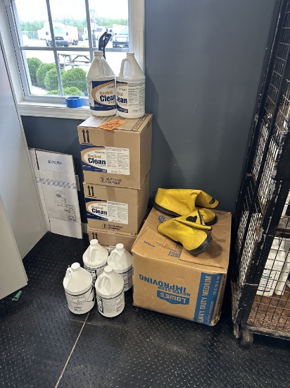 Boxes Of Cleaning Supplies And Boots