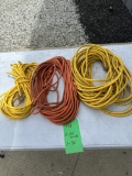 (2) 100ft Extension Cords And (1) 50ft Extension Cord