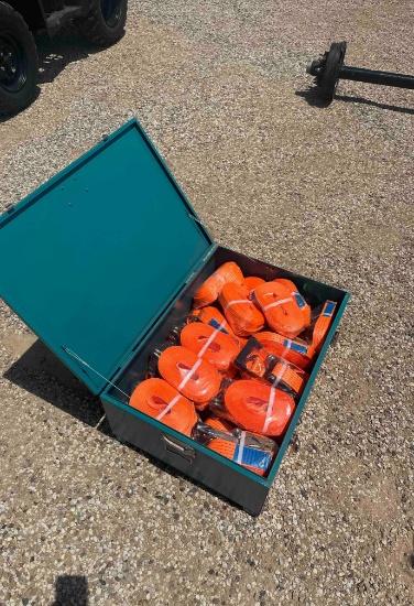 Metal container full of straps