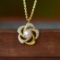 An Exquisite Sterling Silver-Gold Plated Inlaid White Jade Pendant