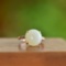 An Exquisite Sterling Silver-Gold Plated Inlaid White Jade Ring