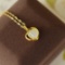 An Exquisite Sterling Silver-Gold Plated Inlaid White Jade Pendant