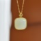 An Exquisite Sterling Silver-Gold Plated Inlaid White Jade Pendant