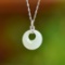An Exquisite Sterling Silver Inlaid White Jade Pendant