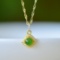 An Exquisite Sterling Silver-Gold Plated Inlaid White Jade Pendant