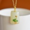 An Exquisite Sterling Silver-Gold Plated Inlaid White Jade Pendant
