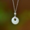 An Exquisite Sterling Silver Inlaid White Jade Pendant