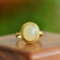 An Exquisite Sterling Silver-Gold Plated Inlaid White Jade Ring