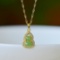An Exquisite Sterling Silver-Gold Plated Inlaid White Jade Pendant