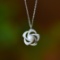 An Exquisite Sterling Silver Inlaid White Jade Pendant