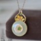An Exquisite Sterling Silver-Gold Plated Inlaid White Jade Pendant