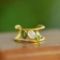 An Exquisite Sterling Silver-Gold Plated Inlaid White Jade Ring