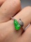 An Exquisite 18k Gold Diamond Inlaid Jadeite Ring