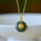 An Exquisite Sterling Silver-Gold Plated Inlaid Jasper Pendant