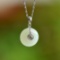 An Exquisite Sterling Silver Inlaid White Jade Pendant