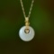 An Exquisite Sterling Silver-Gold Plated Inlaid White Jade Pendant