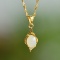 An Exquisite Sterling Silver-Gold Plated Inlaid White Jade Pendant