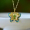 An Exquisite Sterling Silver-Gold Plated Inlaid White Jade Pendant