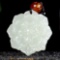 An Exquisite White Jade Lotus Pendant
