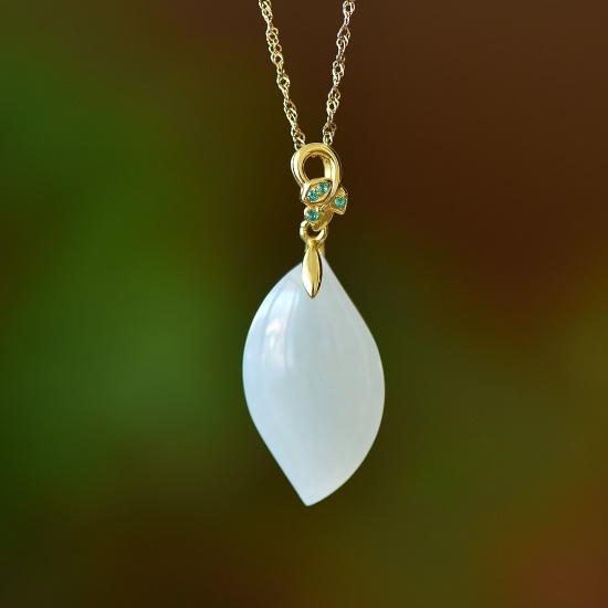An Exquisite Sterling Silver-Gold Plated Inlaid White Jade Pendant