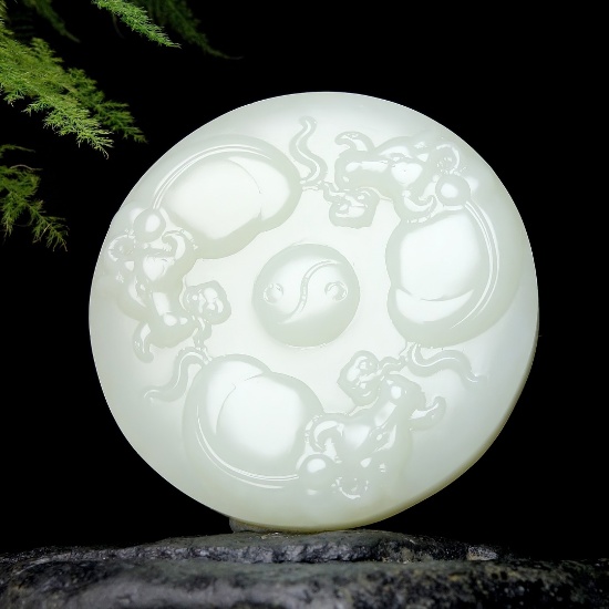 An Exquisite White Jade Buffalo Pattern Pendant