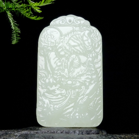 An Exquisite White Jade Auspicious Beast Pattern Pendant