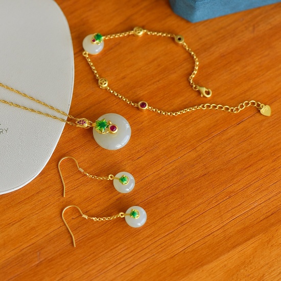 A Set of Fine Sterling Silver-Gold Plated Inlaid White Jade Jewelrys