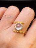 An Exquisite 18k Gold Diamond Inlaid Jadeite Ring
