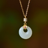 An Exquisite Sterling Silver-Gold Plated Inlaid White Jade Pendant