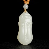 An Exquisite White Jade Buddha-Head Pendant
