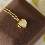 An Exquisite Sterling Silver-Gold Plated Inlaid White Jade Pendant