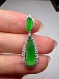 An Exquisite 18k Gold Diamond Inlaid Jadeite Pendant