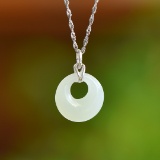 An Exquisite Sterling Silver Inlaid White Jade Pendant
