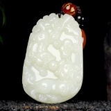 An Exquisite White Jade Auspicious Beast Pendant