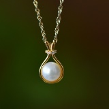 An Exquisite Sterling Silver-Gold Plated Inlaid White Jade Pendant