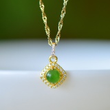 An Exquisite Sterling Silver-Gold Plated Inlaid White Jade Pendant