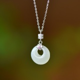 An Exquisite Sterling Silver Inlaid White Jade Pendant