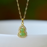 An Exquisite Sterling Silver-Gold Plated Inlaid White Jade Pendant
