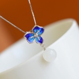 An Exquisite Sterling Silver Inlaid White Jade Pendant