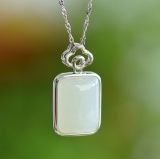 An Exquisite Sterling Silver Inlaid White Jade Pendant