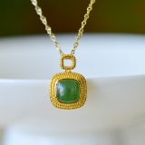 An Exquisite Sterling Silver-Gold Plated Inlaid White Jade Pendant