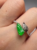 An Exquisite 18k Gold Diamond Inlaid Jadeite Ring