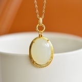 An Exquisite Sterling Silver-Gold Plated Inlaid White Jade Pendant