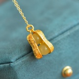 An Exquisite Sterling Silver-Gold Plated Inlaid White Jade Pendant